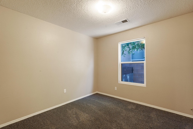1944 Sierra Norte Loop NE, Rio Rancho, NM 87144 - empty room featuring dark colored carpet and a textured ceiling
