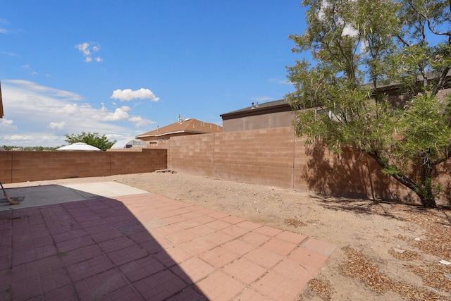 1944 Sierra Norte Loop NE, Rio Rancho, NM 87144 - fenced backyard with a patio area