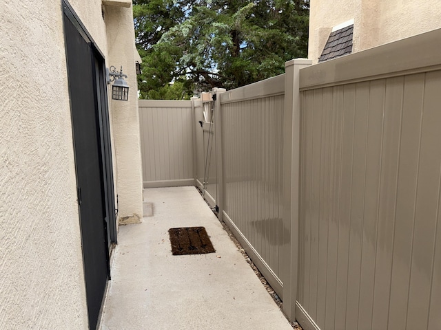 8333 Comanche Rd NE Unit 10B, Albuquerque, NM 87110 - view of patio / terrace with a gate