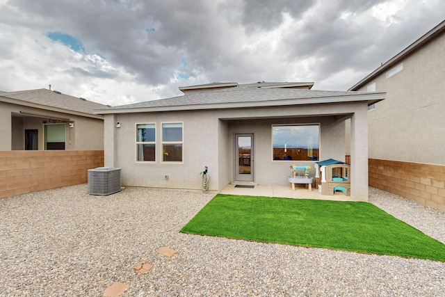 4823 Blackburn Rd NE, Rio Rancho, NM 87144 - rear view of house featuring a fenced backyard, a patio area, a shingled roof, and stucco siding