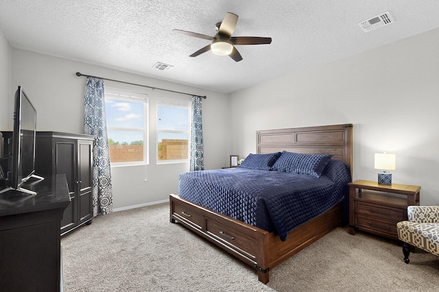 4823 Blackburn Rd NE, Rio Rancho, NM 87144 - carpeted bedroom featuring a textured ceiling and ceiling fan