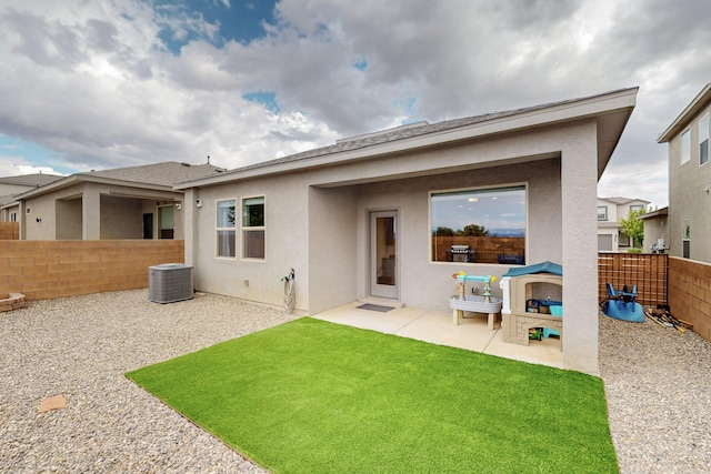 4823 Blackburn Rd NE, Rio Rancho, NM 87144 - back of house with a fenced backyard, a patio, and stucco siding