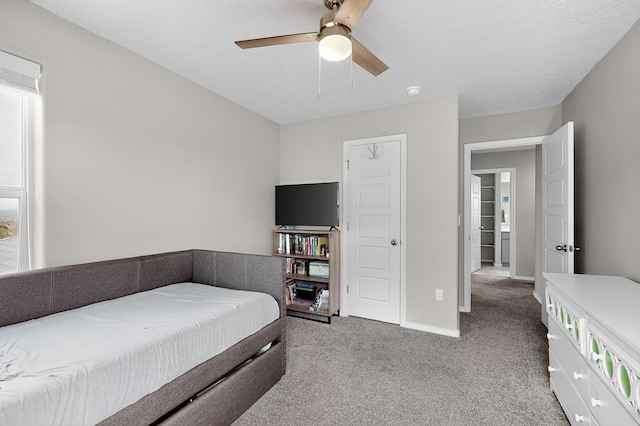 4823 Blackburn Rd NE, Rio Rancho, NM 87144 - carpeted bedroom with baseboards and a ceiling fan