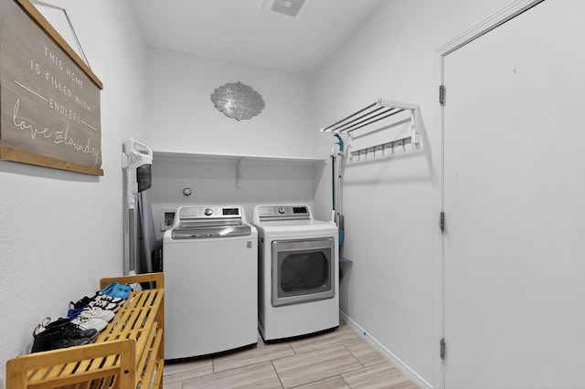 4823 Blackburn Rd NE, Rio Rancho, NM 87144 - laundry area featuring independent washer and dryer and light wood-type flooring