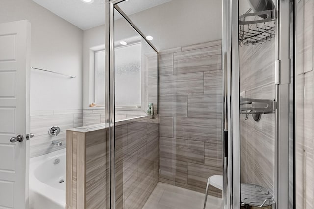 4823 Blackburn Rd NE, Rio Rancho, NM 87144 - bathroom featuring a garden tub and a shower stall