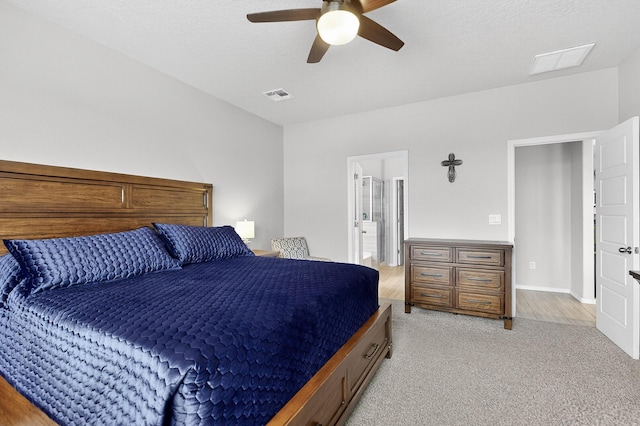 4823 Blackburn Rd NE, Rio Rancho, NM 87144 - bedroom featuring light carpet, ceiling fan, and ensuite bath