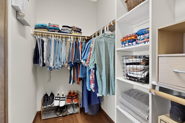 1324 Wilkes Way SE, Rio Rancho, NM 87124 - spacious closet featuring wood finished floors
