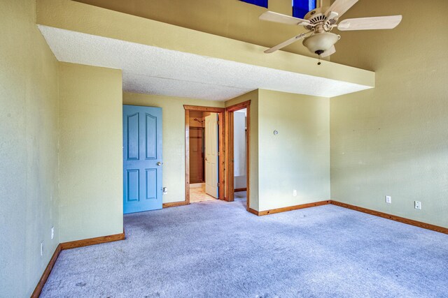10 Quail Run Rd, Tijeras, NM 87059 - empty room featuring carpet flooring, a ceiling fan, and a textured ceiling