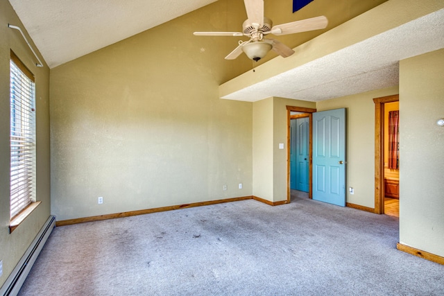 10 Quail Run Rd, Tijeras, NM 87059 - spare room featuring baseboard heating, carpet floors, vaulted ceiling, ceiling fan, and a textured ceiling