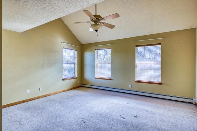 10 Quail Run Rd, Tijeras, NM 87059 - empty room featuring a baseboard heating unit, carpet floors, a textured ceiling, a ceiling fan, and lofted ceiling