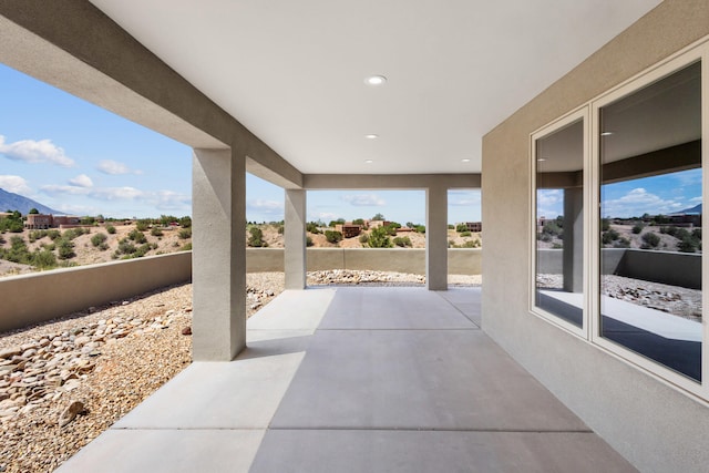 7 Aztec Ct, Placitas, NM 87043 - view of patio featuring a mountain view