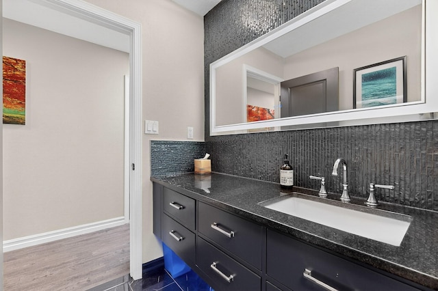 6205 Peachtree Pl NE, Albuquerque, NM 87111 - bathroom with decorative backsplash and vanity