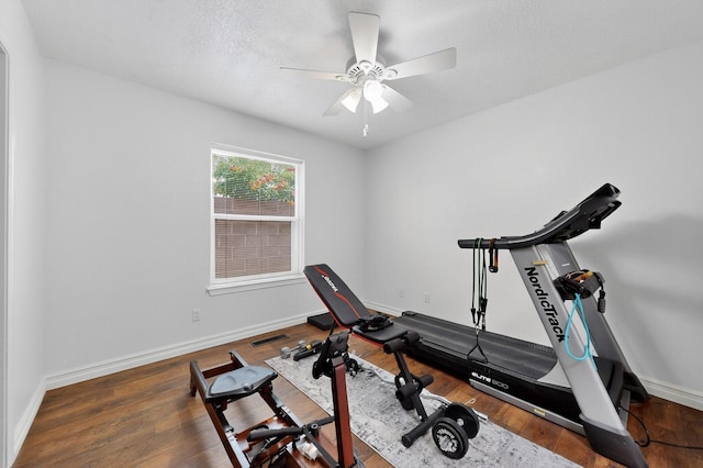 6205 Peachtree Pl NE, Albuquerque, NM 87111 - workout room with a ceiling fan and wood finished floors