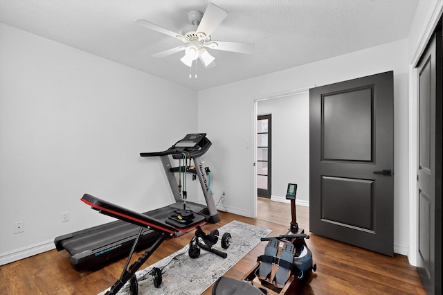 6205 Peachtree Pl NE, Albuquerque, NM 87111 - exercise room featuring wood finished floors and ceiling fan