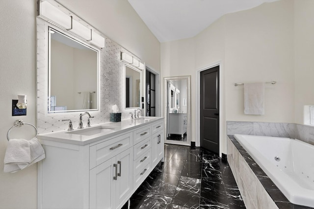 6205 Peachtree Pl NE, Albuquerque, NM 87111 - full bathroom with a jetted tub, double vanity, and marble finish flooring
