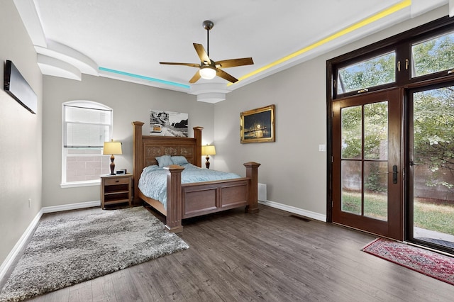 6205 Peachtree Pl NE, Albuquerque, NM 87111 - bedroom with access to outside, dark wood-type flooring, and a ceiling fan