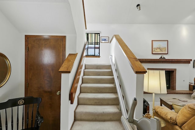 11213 Paseo Del Oso, Albuquerque, NM 87111 - stairs with vaulted ceiling and carpet flooring