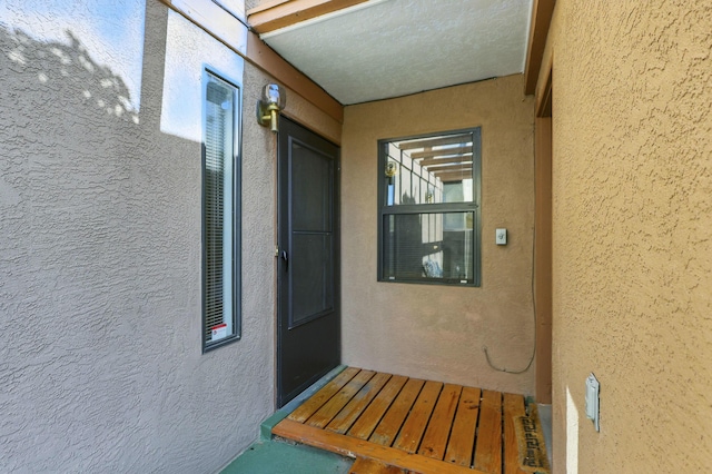 11213 Paseo Del Oso, Albuquerque, NM 87111 - property entrance featuring stucco siding