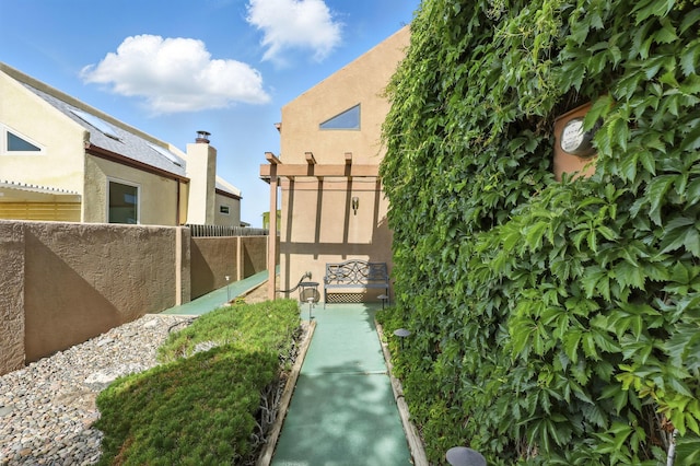 11213 Paseo Del Oso, Albuquerque, NM 87111 - fenced backyard featuring a pergola