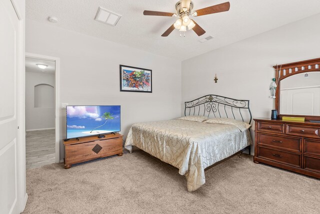 2660 Firewheel Ave SW, Los Lunas, NM 87031 - carpeted bedroom with lofted ceiling and ceiling fan