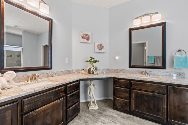 2660 Firewheel Ave SW, Los Lunas, NM 87031 - full bathroom featuring vanity and a shower