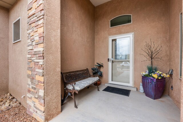 2660 Firewheel Ave SW, Los Lunas, NM 87031 - entrance to property featuring stucco siding