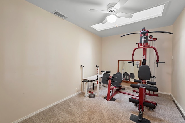 6268 Apache Plume Rd NE, Rio Rancho, NM 87144 - workout area featuring ceiling fan, a skylight, and carpet