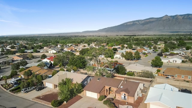6268 Apache Plume Rd NE, Rio Rancho, NM 87144 - aerial view of residential area featuring a mountain backdrop