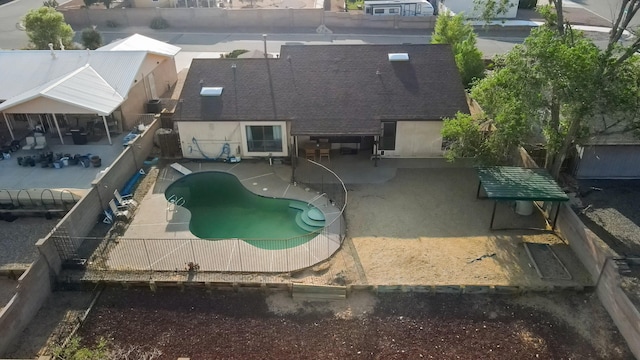 6268 Apache Plume Rd NE, Rio Rancho, NM 87144 - view of swimming pool featuring a patio and a fenced backyard