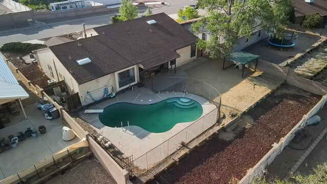 6268 Apache Plume Rd NE, Rio Rancho, NM 87144 - view of pool featuring a patio area and a fenced backyard