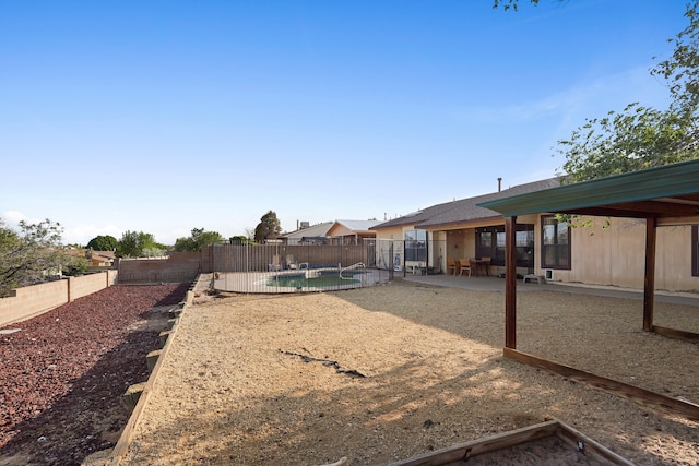 6268 Apache Plume Rd NE, Rio Rancho, NM 87144 - fenced backyard featuring a patio