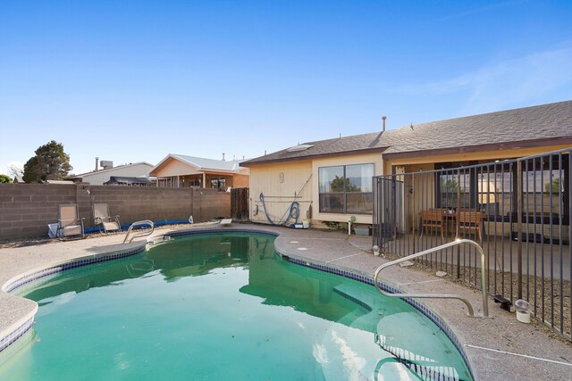 6268 Apache Plume Rd NE, Rio Rancho, NM 87144 - view of pool featuring a patio area