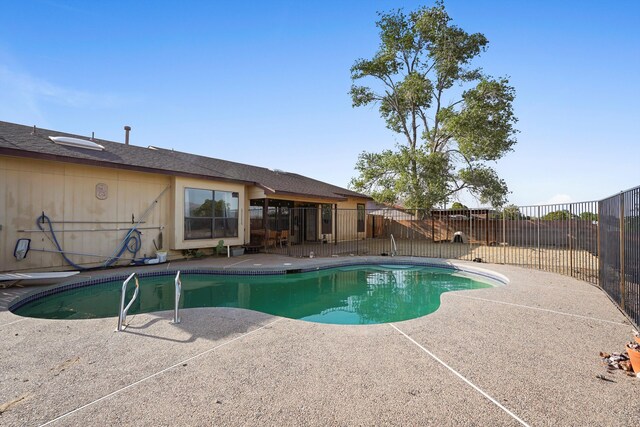 6268 Apache Plume Rd NE, Rio Rancho, NM 87144 - view of swimming pool with a patio area