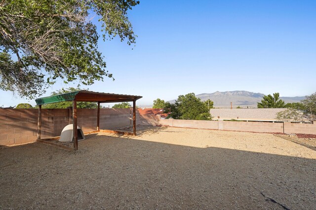 6268 Apache Plume Rd NE, Rio Rancho, NM 87144 - fenced backyard with a mountain view