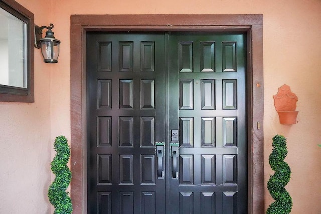 4441 Kellia Ln NE, Albuquerque, NM 87111 - property entrance featuring stucco siding