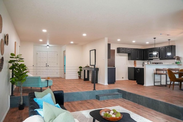 4441 Kellia Ln NE, Albuquerque, NM 87111 - living area with light wood-type flooring and recessed lighting