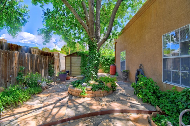 6749 Kelly Ann Rd NE, Albuquerque, NM 87109 - view of patio / terrace featuring a storage shed