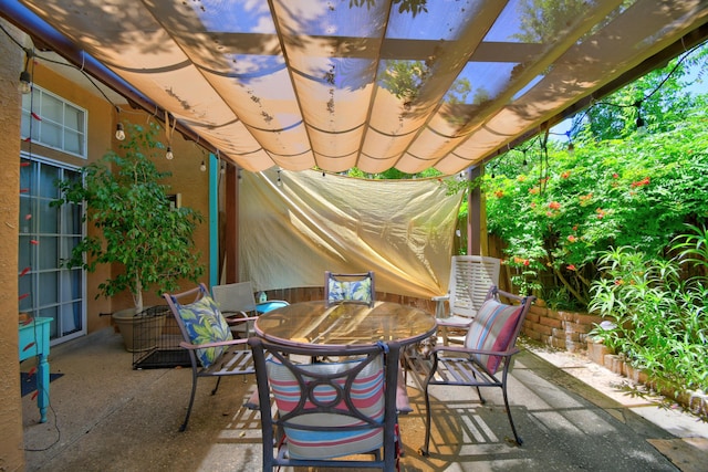 6749 Kelly Ann Rd NE, Albuquerque, NM 87109 - view of patio featuring outdoor dining space