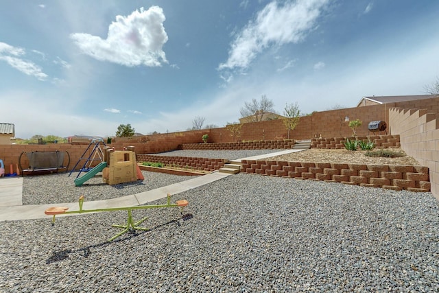 1854 Valle Vista Rd NW, Los Lunas, NM 87031 - communal playground featuring a fenced backyard