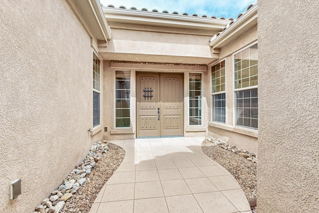 2413 Desert View Rd NE, Rio Rancho, NM 87144 - view of exterior entry with stucco siding