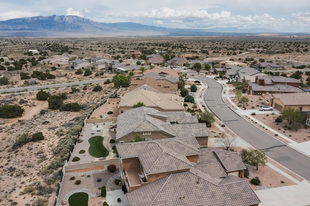2413 Desert View Rd NE, Rio Rancho, NM 87144 - aerial perspective of suburban area with a mountainous background and a desert landscape