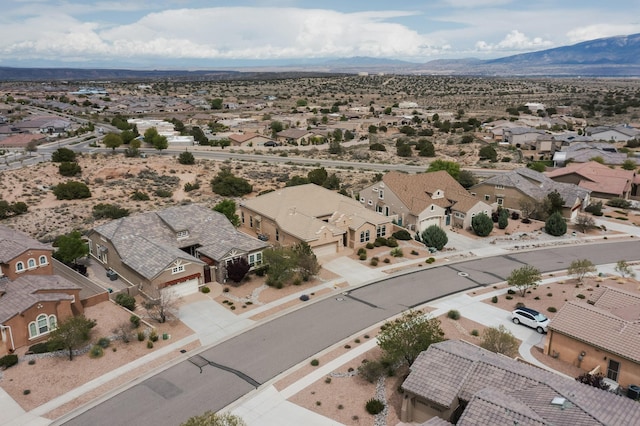 2413 Desert View Rd NE, Rio Rancho, NM 87144 - aerial perspective of suburban area with a mountainous background