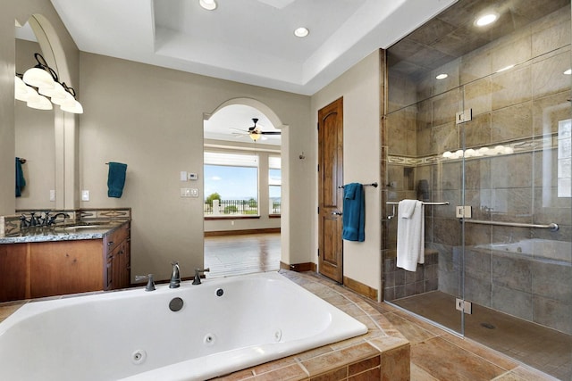 2413 Desert View Rd NE, Rio Rancho, NM 87144 - bathroom featuring a tub with jets, vanity, a shower stall, a ceiling fan, and recessed lighting