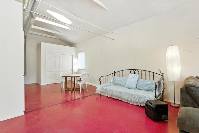6205 Darlene Pl SW, Albuquerque, NM 87105 - bedroom featuring lofted ceiling, a skylight, and concrete floors