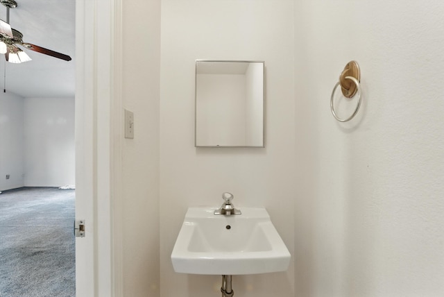 6205 Darlene Pl SW, Albuquerque, NM 87105 - bathroom with ceiling fan and a sink