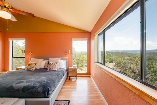 23 Cooper Rd, Cedar Crest, NM 87008 - bedroom featuring lofted ceiling, light wood-type flooring, and ceiling fan