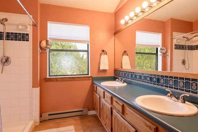23 Cooper Rd, Cedar Crest, NM 87008 - bathroom with baseboard heating, tiled shower, tile patterned floors, and double vanity