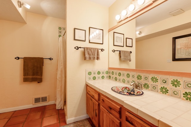 23 Cooper Rd, Cedar Crest, NM 87008 - full bath featuring vanity, backsplash, tile patterned floors, and a shower with shower curtain