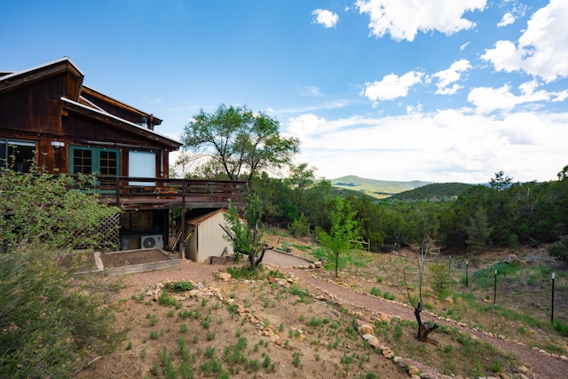 23 Cooper Rd, Cedar Crest, NM 87008 - view of yard featuring a deck with mountain view