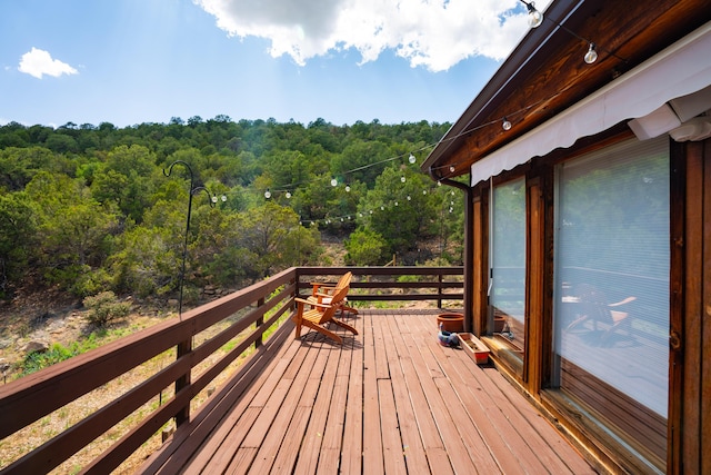 23 Cooper Rd, Cedar Crest, NM 87008 - wooden terrace featuring a view of trees